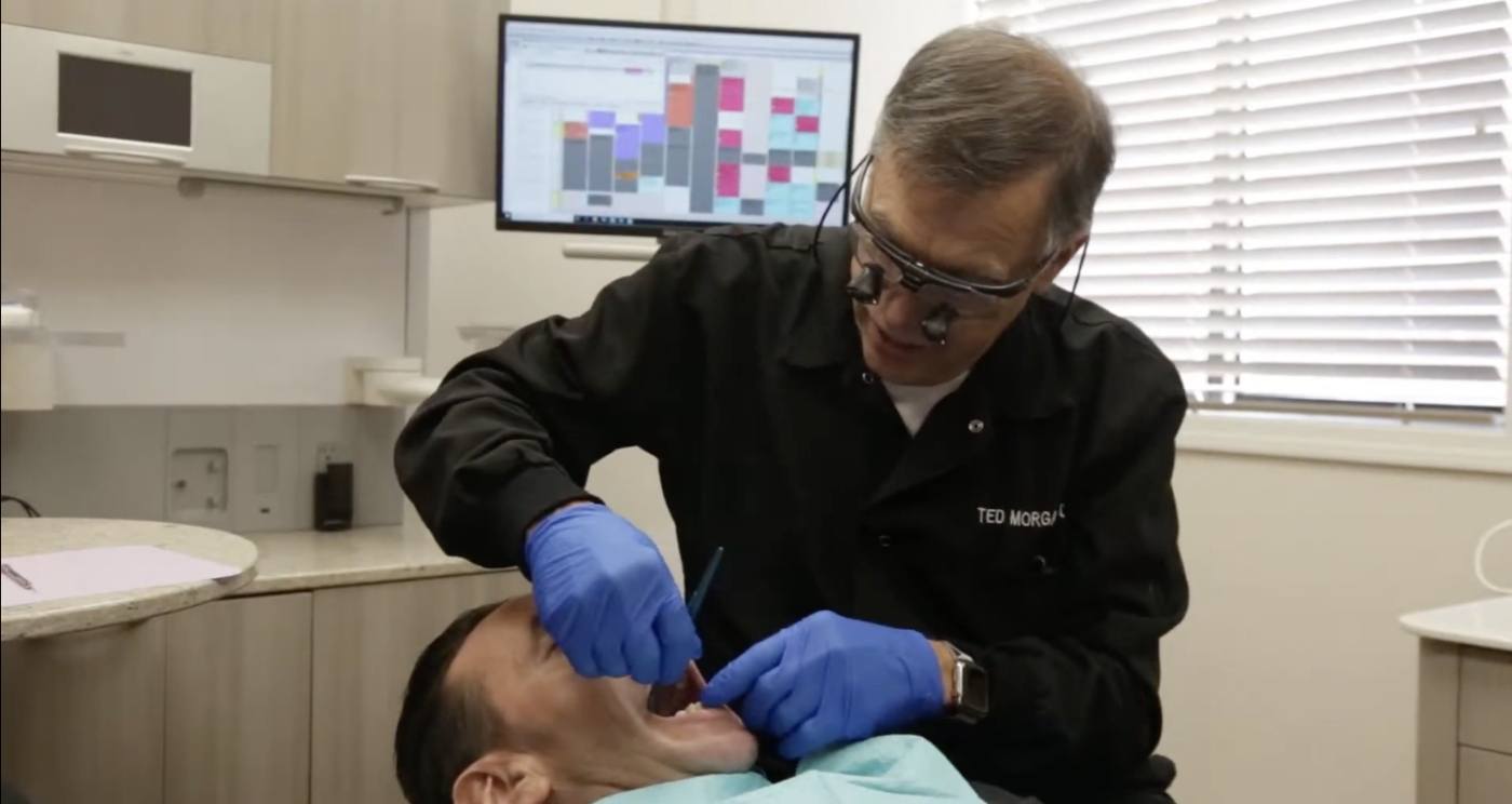 Doctor Ted treating a dental patient